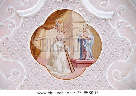 BRONNBACH, GERMANY - JULY 07, 2018: Ceiling frescoes with scenes from the life of St. Bernard of Clairvaux by Johann Adam Remele in Bernard Hall, Cistercian Abbey of Bronbach in Reicholzheim, Germany