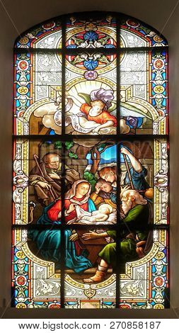 AALEN, GERMANY - JULY 12, 2018: Nativity Scene, stained glass window in the Saint Nicholas Evangelical church, Aalen, Germany