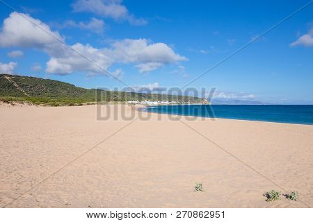 Lonely Varadero Beach And Canos De Meca Village In Cadiz