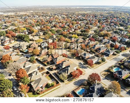 Top View Residential Neighborhood With Swimming Pool In Fall Season In Texas, America