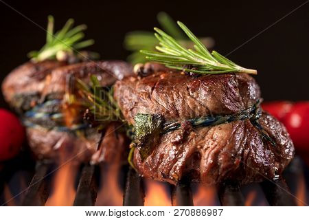 Fresh Fillet Steak On Grill With Flammes.