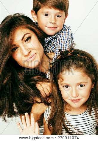 Young Mother With Two Children On White Background, Happy Smilin