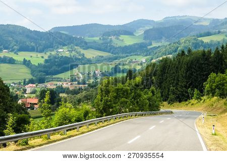 Griffen, Austria - August, 17th, 2017. Road Curves In Austrian Mountains.
