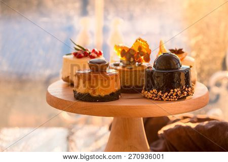 Heaps Of Various Cheesecake Is One Type Of Chocolate Cake. Vintage Tone. Christmas Orange Cheesecake