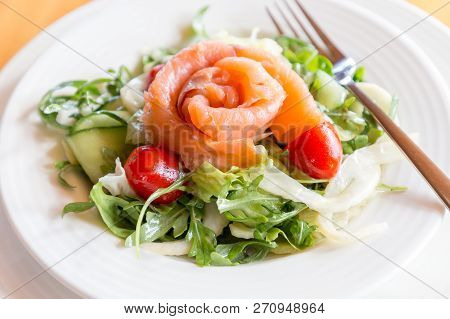 Salad Mix With Smoked Samlon Fillet And Campari Cherry Tomatoes.