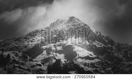Amazing Light Passing Through Clouds And Falling On The Snow Clad Zabarwan Mountain Range In Srinaga