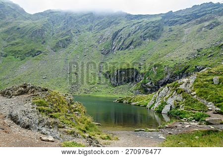 The Glacier Lake Called Balea (balea Lac) On The Transfagarasan Road From Fagaras Mountains