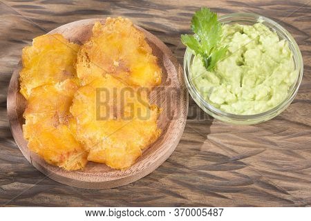 Patacón Fried Flattened Pieces Of Green Plantain (tostón, Tachino)