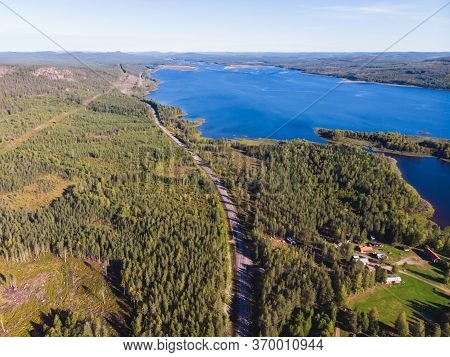 View Of Kalix River, Kalixalven, Overkalix Locality And The Seat In Norrbotten County, Sweden, With