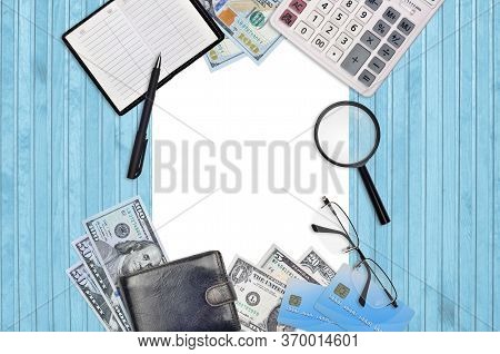 Office Flat Lay Composition With Calculator, Address Book And Other Office Items On Brown Wooden Tab