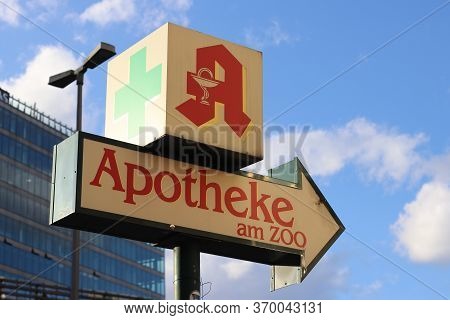 Berlin, Germany - February 12, 2020: Red Pharmacy Sign - Apotheke Am Zoo In Berlin, Germany