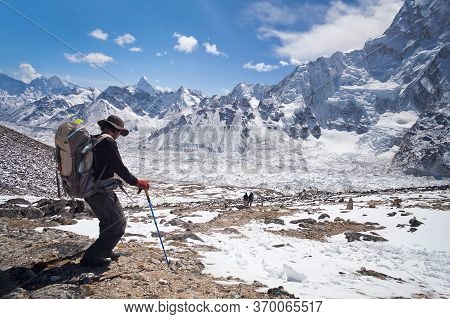 Khumbu, Nepal - March 17, 2010: Climber Going To Everest Base Camp In Sagarmatha National Park, Ever