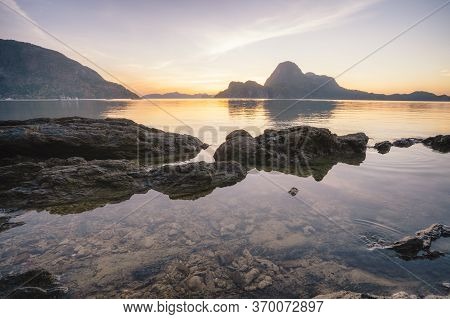 Sunset In El Nido, Beautiful Cadlao Island And Low Tide With Surface Reflection In Foreground. Palaw