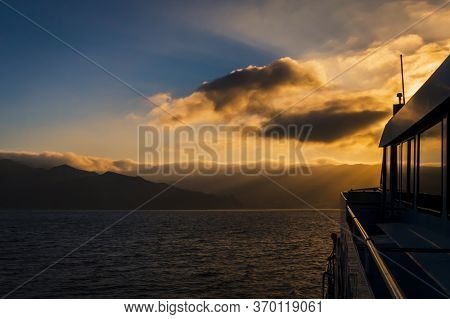 Watching The Sunset Gorgeous Sunlight Over The Clouds On The Boat