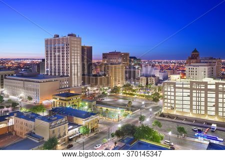 El Paso, Texas, USA  downtown city skyline at dusk with Juarez, Mexico in the distance.
