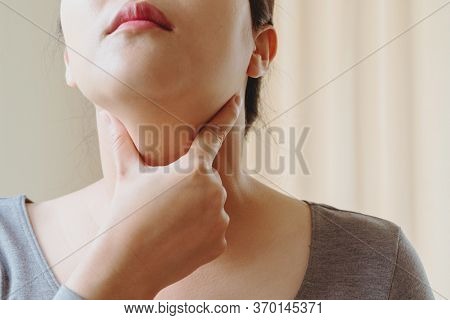 Women With Thyroid Gland Test . Endocrinology, Hormones And Treatment. Inflammation Of The Sore Thro