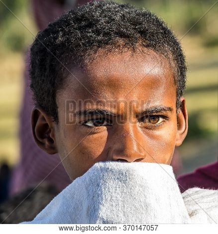 Gondar, Ethiopia - Feb 06, 2020: Ethiopian Boy On The Roads Of Gondar In Ethiopia, Africa