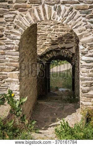 Gateway Through The Wall Of A Medieval Castle Ruin.