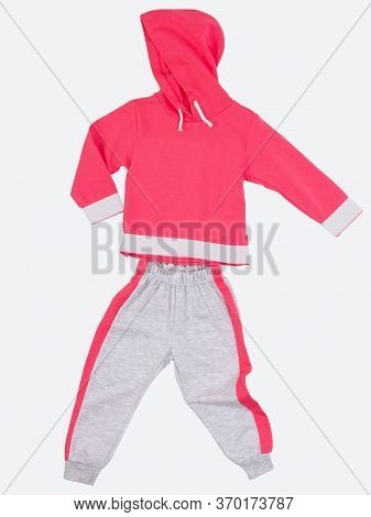 Tracksuit Runs Without A Body On A White Background