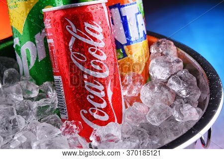Cans Of Assorted Coca Cola Company Soft Drinks