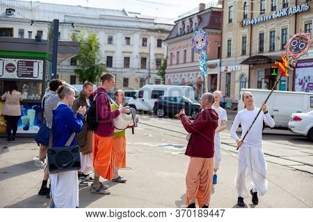 Ukraine, Kiev - June 5, 2020: Krishnaites Walk Along The Street, Sing And Dance. Religious Ukrainian