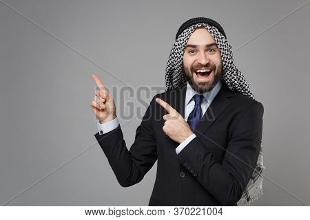 Amazed Bearded Arabian Muslim Businessman In Keffiyeh Kafiya Ring Igal Agal Classic Black Suit Isola