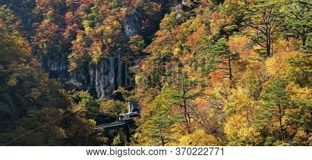Naruko Gorge valley with train railroad tunnel in Miyagi Tohoku Japan panorama