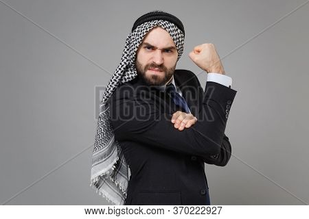 Strong Young Bearded Arabian Muslim Businessman In Keffiyeh Kafiya Ring Igal Agal Classic Black Suit