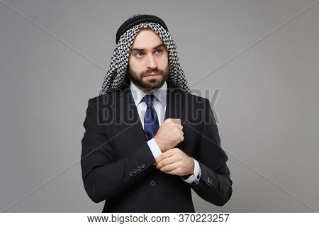 Young Bearded Arabian Muslim Businessman In Keffiyeh Kafiya Ring Igal Agal Classic Black Suit Shirt 