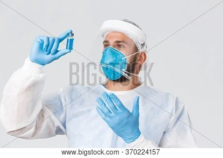 Covid-19 Pandemic, Virus Outbreak, Clinic And Healthcare Workers Concept. Excited Pationate Male Doc