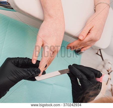 Manicurist At Work, Beaty Manicure Nails. Manicure Process. Closeup Photo Shoot Of Manicure Process 