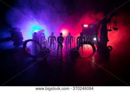 Police Cars At Night. Police Car Chasing A Car At Night With Fog Background. 911 Emergency Response