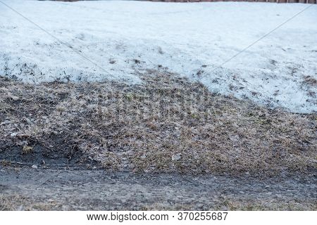 Spring Is On The Street. Dirty Snow. Snow Melts. Spring Weather.