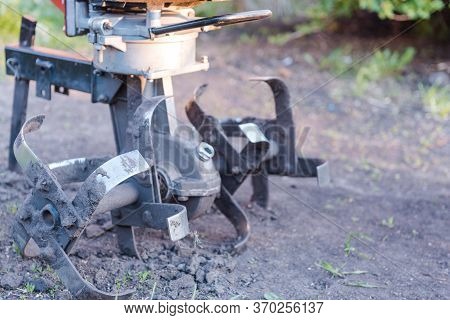 Motoblock. Plow The Land. Cultivate The Soil. Prepare For Planting In The Garden. Plowed Soil. Agric