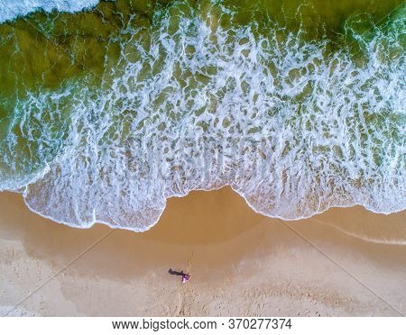 Aerial View Of The Waves Crashing On The Beach At Perdido Key, Florida
