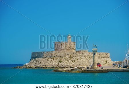 Rhodes, Greece - July 2019: Mandraki Harbor In Sunny Day