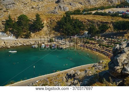 Rhodes, Greece - July 2019: Agios Pavlos Beach. Overlooking The Stunning St Pauls Bay Lindos