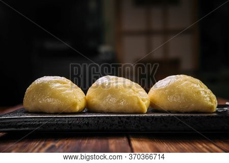 Side View On Korean Steamed Pjan-se Pigodi Pies With Cabbage And Meat , Horizontal
