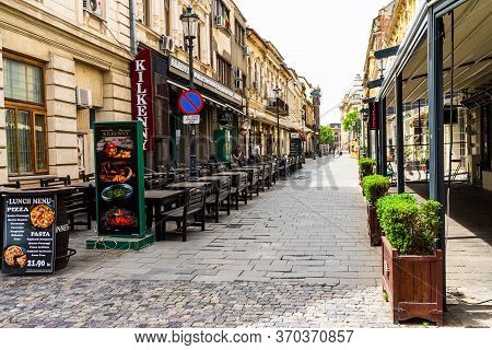 Empty Tables At Local Restaurants In Old Town Bucharest Due To Coronavirus Worldwide Outbreak Crisis