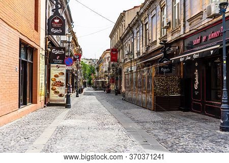 Empty Tables At Local Restaurants In Old Town Bucharest Due To Coronavirus Worldwide Outbreak Crisis
