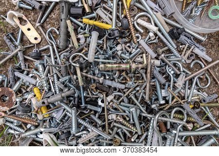Assorted Metalware Bolts And Nuts Flat Lay. Work Tools Closeup. Abstract Industrial Background For F