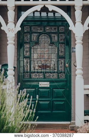 London, Uk - May 26, 2020: Dark Green Stained Glass Front Door Of A Traditional Edwardian House In L