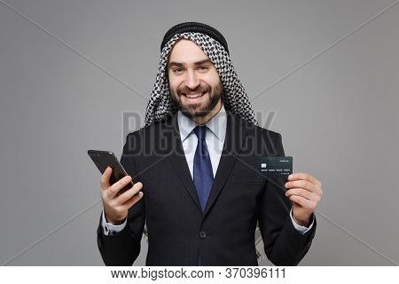 Smiling Bearded Arabian Muslim Businessman In Keffiyeh Kafiya Ring Igal Agal Classic Suit Isolated O