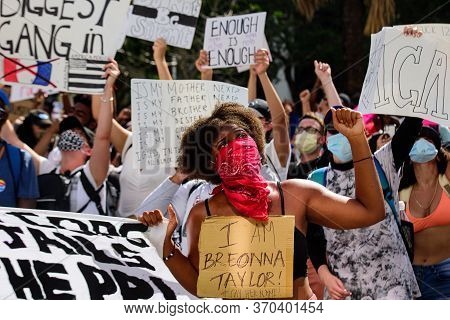 Miami Downtown, Fl, Usa - May 31, 2020: Black Woman Protesting Against Racism. Breonna Taylor Memori