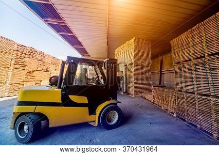 Forklift Loader Load Lumber Into A Dry Kiln. Wood Drying In Containers.