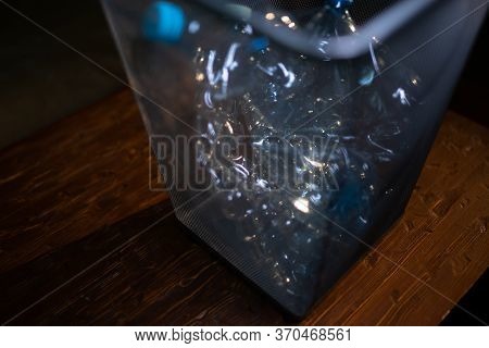 Plastic Single Use Water Bottles Being Thrown Into A Recycling Bin - Too Much Plastic Waste Is Being
