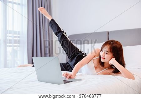 Asian Woman Workout At Home. Yoga And Exercise Online Class. New Normal Life After Covid-19. Wellnes