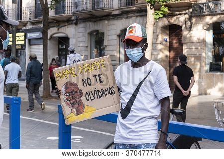 Palma De Mallorca, Spain - June 07 2020: Palma De Mallorca, Spain - June 07 2020: Young Man Holding 