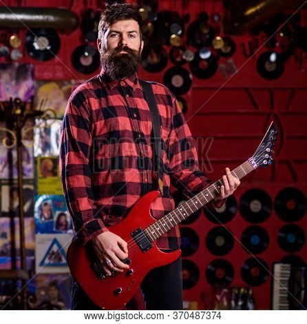Frontman Concept. Musician With Beard Play Electric Guitar
