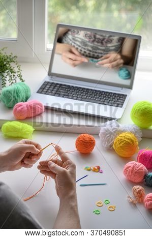 Selective Focus On The Hands Of A Man Sitting At The Table And Watching A Video Step By Step Guide O